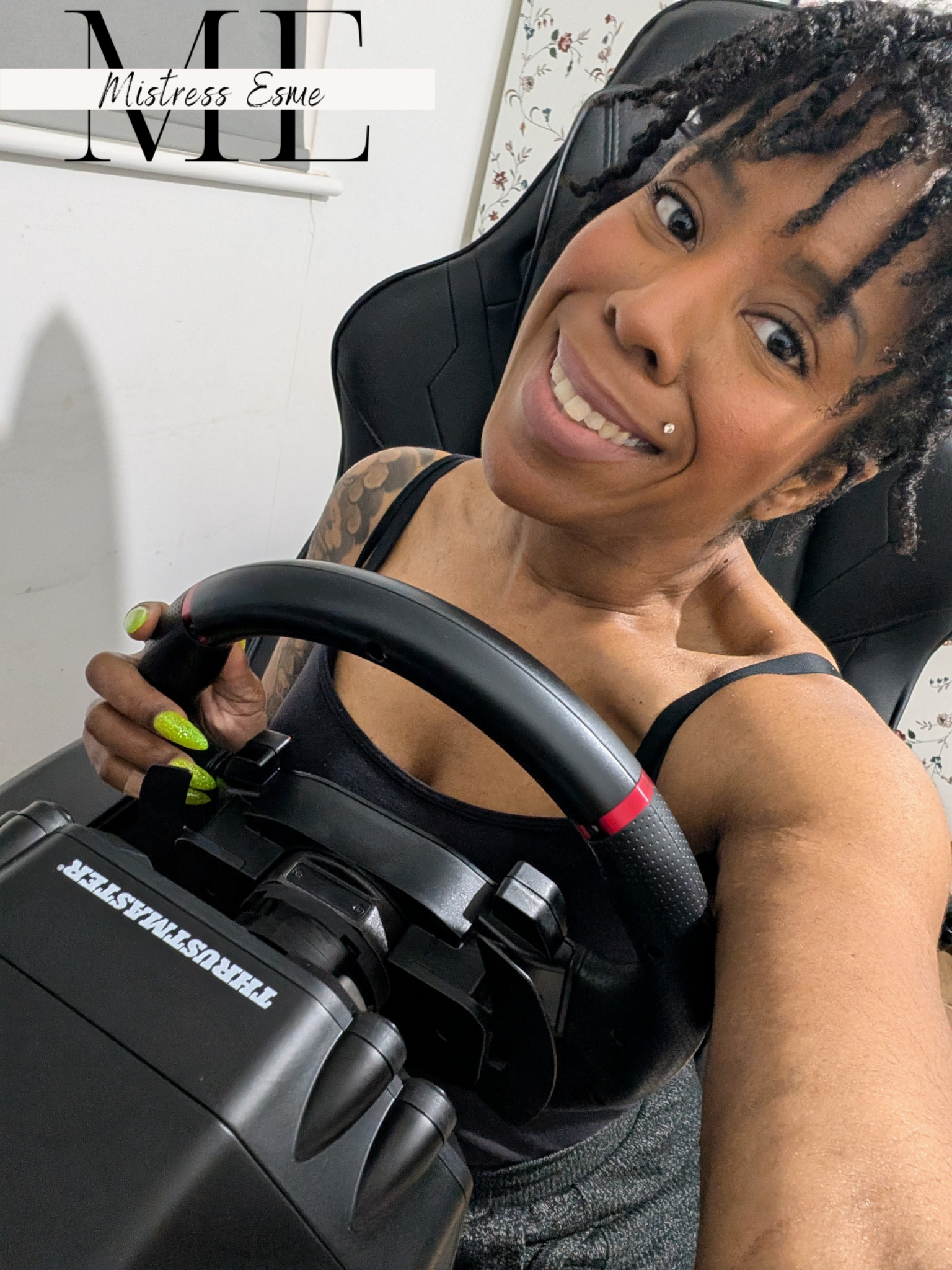 Thrustmaster T598 Mistress Esme has a sim racing wheel